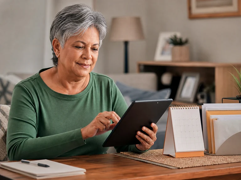 Senior on a video telehealth visit using a free government tablet